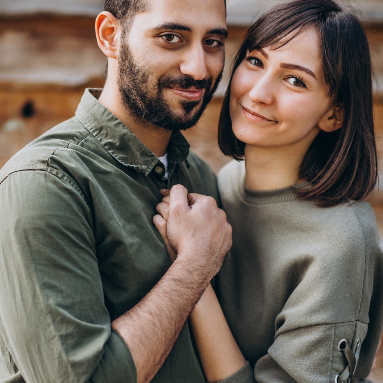 Young international couple together in park